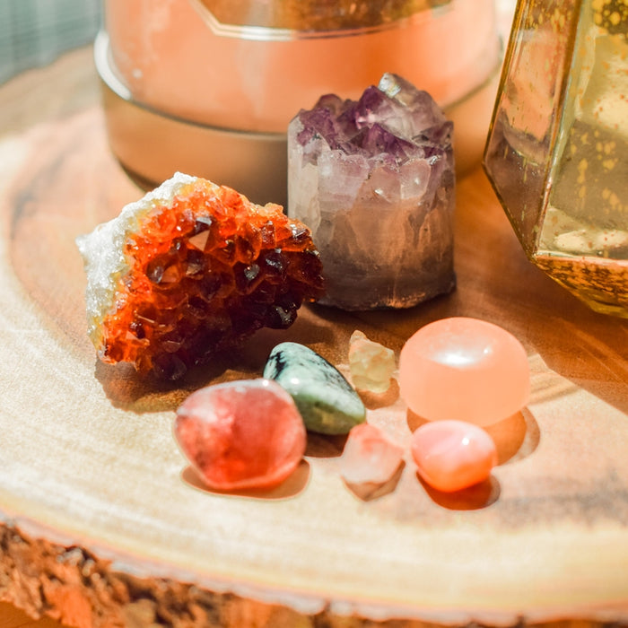a wooden table topped with different types of rocks