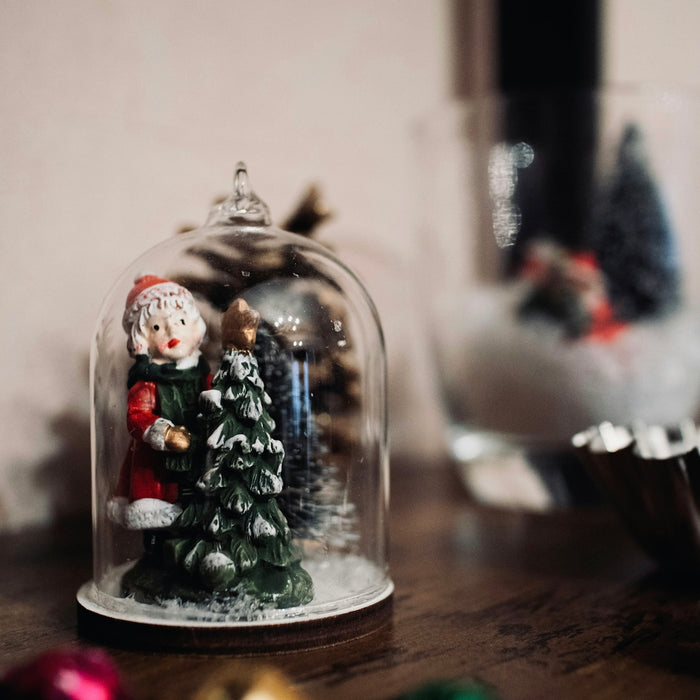 white and red ceramic figurine
