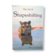 Book cover of 'The Art of Shapeshifting' with a tiger reflection in water.