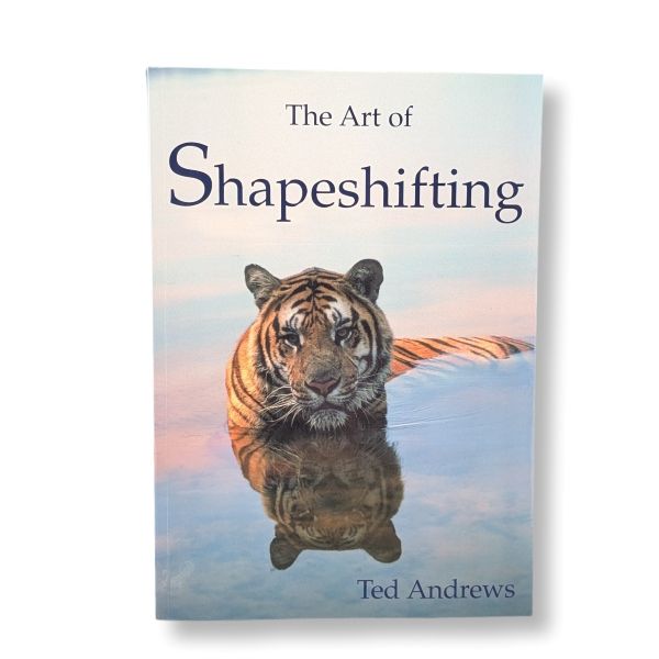 Book cover of 'The Art of Shapeshifting' with a tiger reflection in water.
