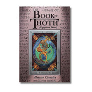 Book of Thoth tarot book cover with Egyptian design and text