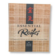 Book titled 'Essential Reiki' by Diane Stein on a white background