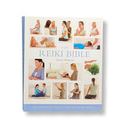 Book titled 'The Reiki Bible' with images of people practicing Reiki on a white background