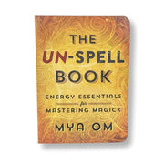Book titled 'The Un-Spell Book' by Mya Om on a white background