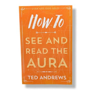 Book cover of 'How To See And Read The Aura' by Ted Andrews with an orange background.