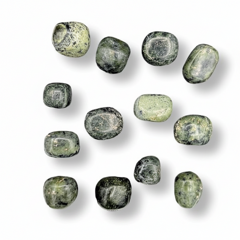 Set of green stones on a white background