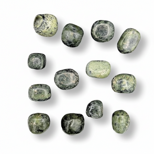Set of green stones on a white background