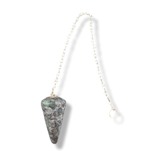 Crystal pendulum on a white background