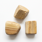 Three rocks on a white background