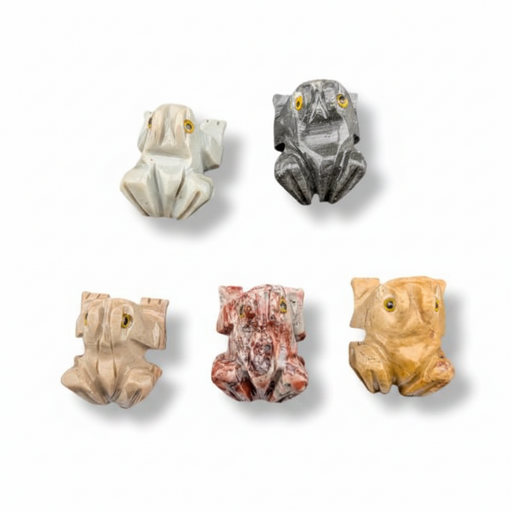 Five small frog-shaped jewelry pieces or charms in different stone-like colors, arranged on a plain white background.
