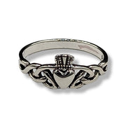 Silver claddagh ring on a white background