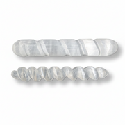 Two spiral-shaped selenite wands, shown on a clean white background. One is wider and positioned above, while the other is narrower and positioned below.