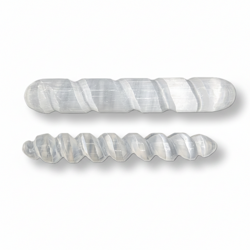 Two spiral-shaped selenite wands, shown on a clean white background. One is wider and positioned above, while the other is narrower and positioned below.