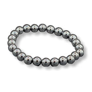 Black beaded bracelet on a white background