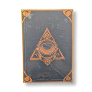 Decorative notebook with eye design on a white background