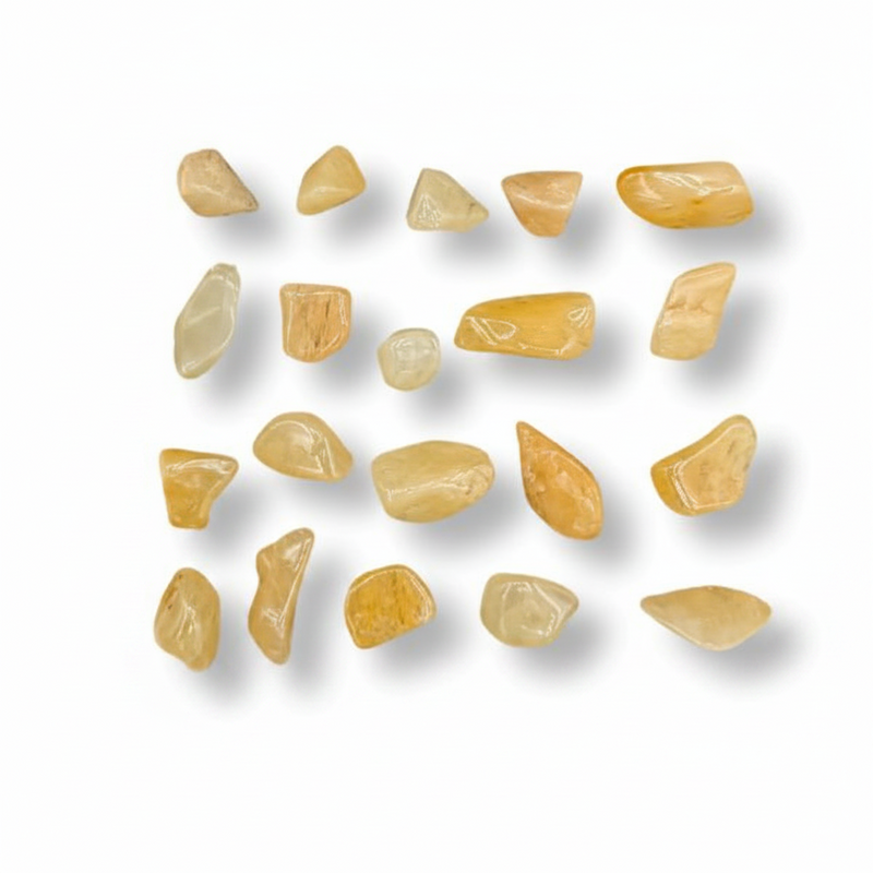 Set of yellow stone tumbled on a white background