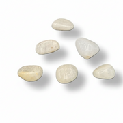 White stones on a white background