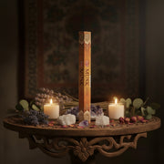 Pack of HEM Musk incense sticks on a table surrounded by crystals, dried flowers and candles 