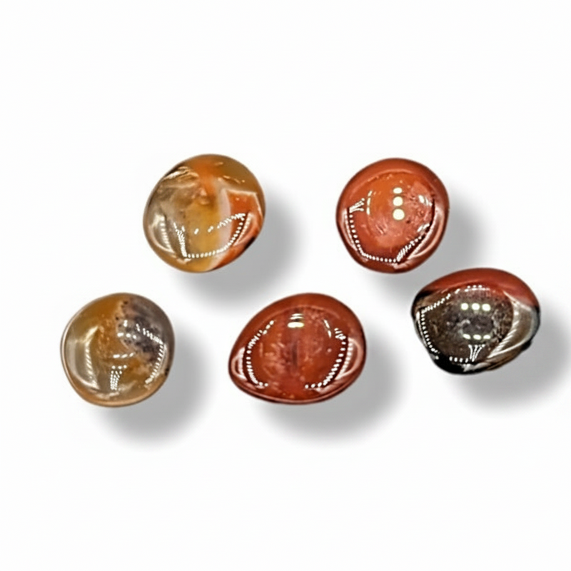 Carnelian earth stones on a white background. 