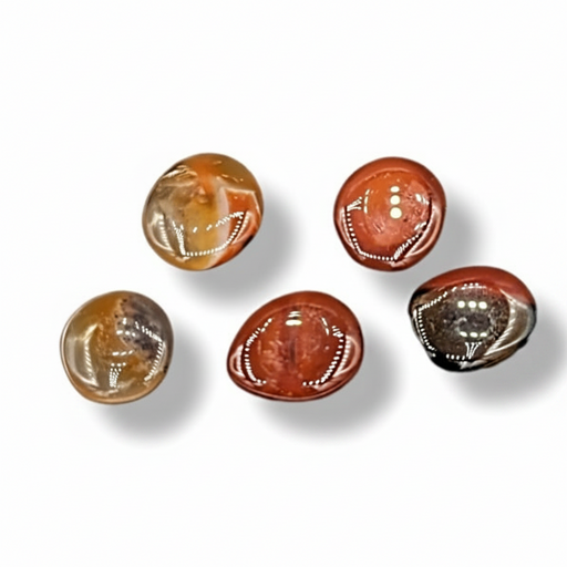 Carnelian earth stones on a white background. 