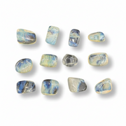 Set of yellow obsidian stones on a white background