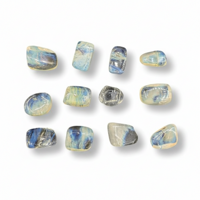 Set of yellow obsidian stones on a white background
