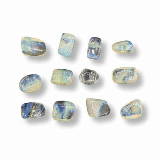 Set of yellow obsidian stones on a white background