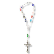 Colorful beaded rosary with a cross on a white background