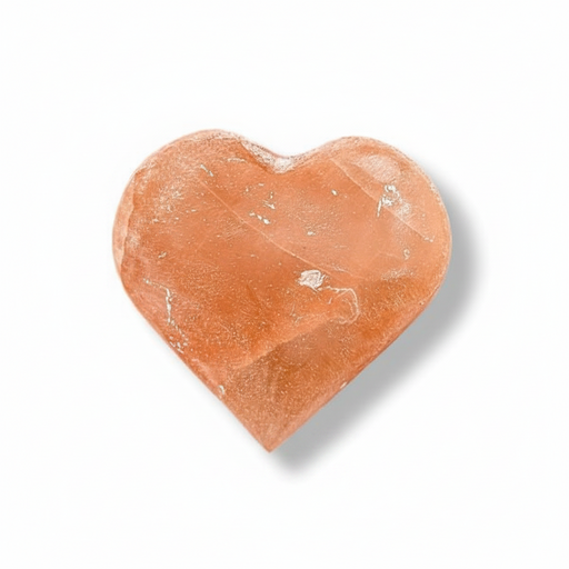 A heart-shaped orange selenite with a natural crystalline texture, shown on a clean white background with a soft drop shadow.
