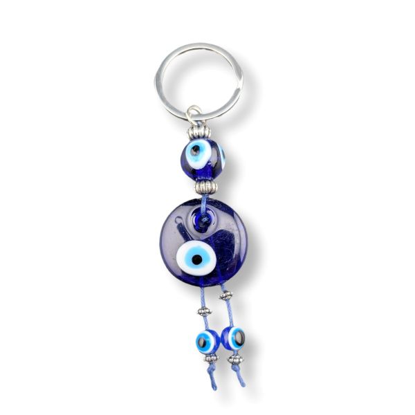 Keychain with blue evil eye beads on a white background