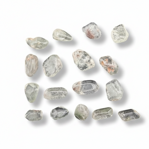 A set of small, irregular clear gemstones with natural inclusions and subtle gray, green, and brown tones, arranged on a plain white background with soft drop shadows.