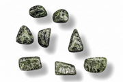 Green crystals on a white background