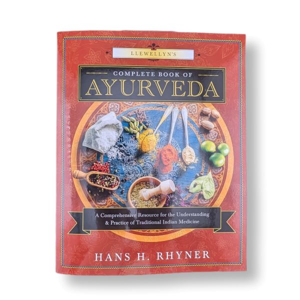 Ayurveda: Complete Book of Ayurveda by Hans H. Rhyner, featuring a red cover with a central circular illustration of traditional Indian medicine ingredients and utensils.