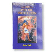 Book titled 'The Art of Psychic Protection' by Judy Hall with a purple cover and illustration of a figure holding a staff.