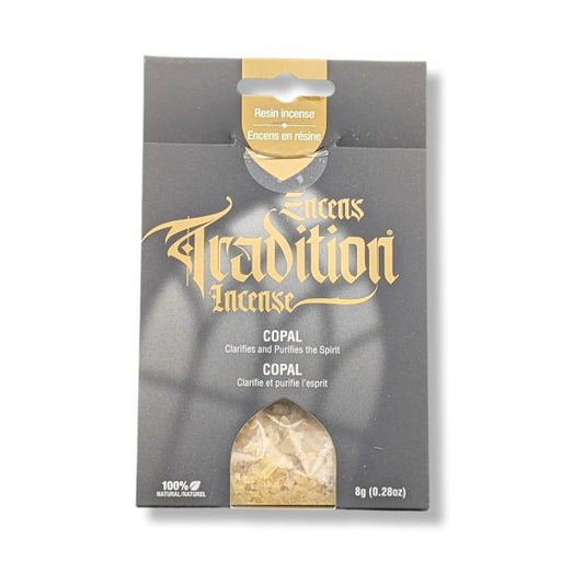 A package of Tradition Incense Copal resin incense, featuring a dark gray and gold box with a clear window showing the incense inside, set against a plain white background.