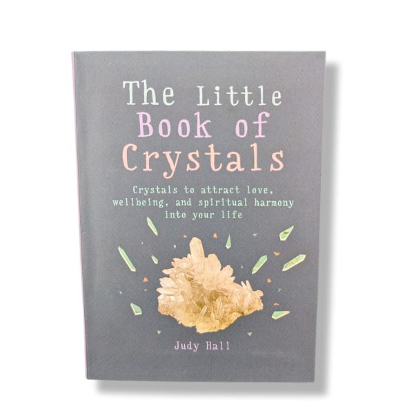 Book titled 'The Little Book of Crystals' with a crystal illustration on a gray background