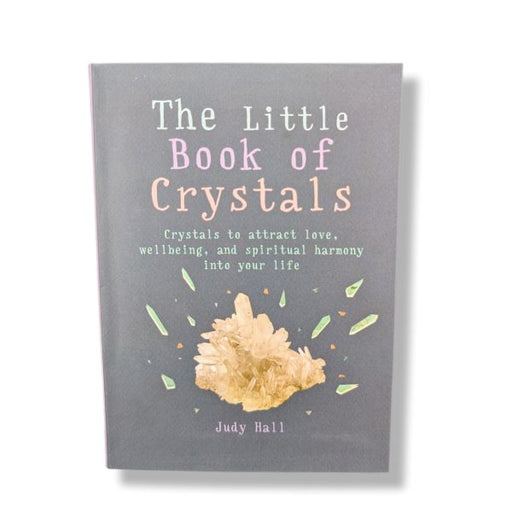 Book titled 'The Little Book of Crystals' with a crystal illustration on a gray background