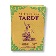 Book titled 'A Little Bit of Tarot' by Cassandra Eason on a white background
