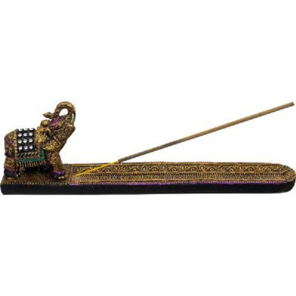 A decorative brass incense holder with an elephant figurine on a white background