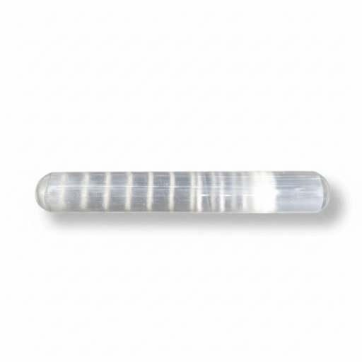 A cylindrical selenite with rounded ends, photographed on a white background with a soft shadow.