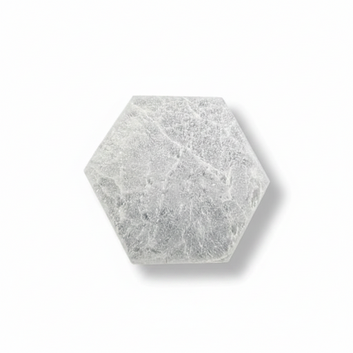 A hexagonal selenite plate, shown on a clean white background with a soft drop shadow.