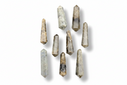 A set of nine natural labradorite  points of varying shapes and sizes, displayed against a clean white background with soft drop shadows.
