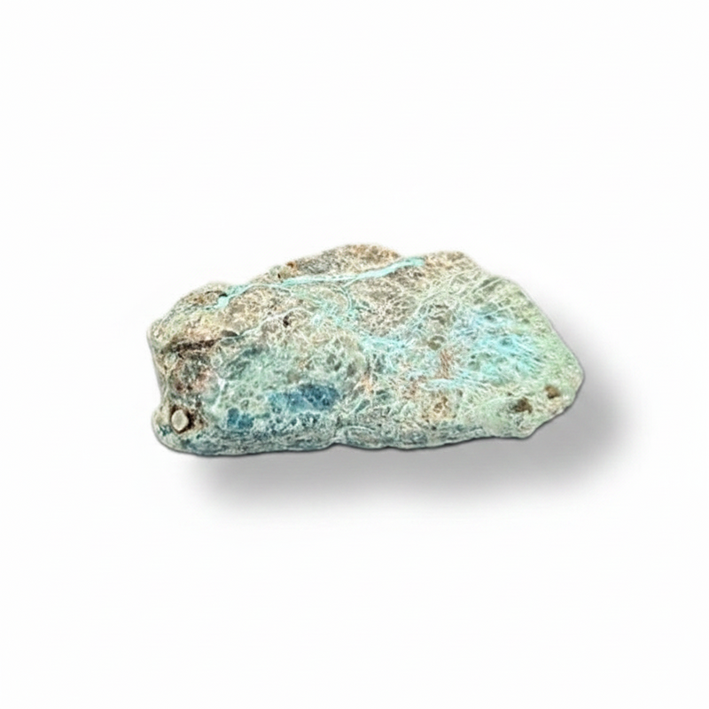 Raw shattuckaite stone on a white background
