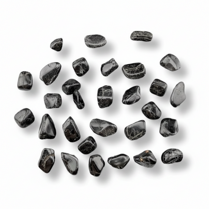 Collection of black stones on a white background
