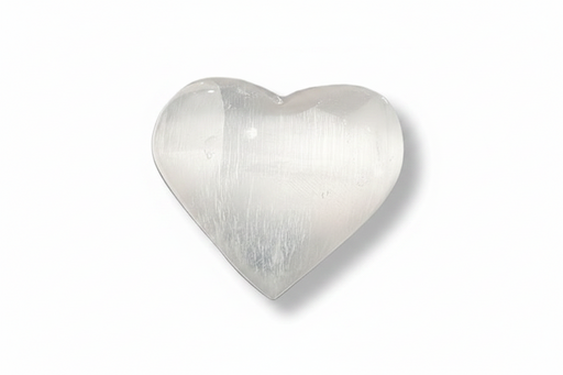 A polished heart-shaped selenite with a smooth, lustrous surface and subtle striations, shown on a plain white background with a soft drop shadow.