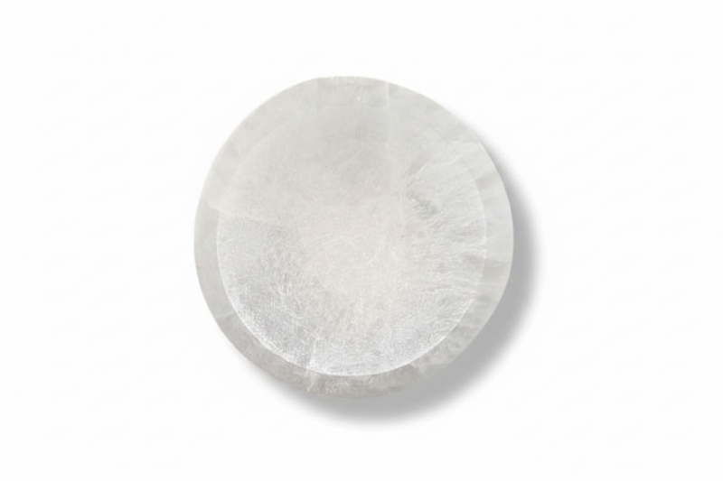 A round, selenite 6cm bowl,  shown on a clean white background with a soft drop shadow.