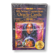 Packaged Oracle Cards with a purple cover featuring an illustration of a woman and card images.