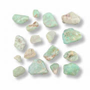 Collection of chrysoprase stones on a white background