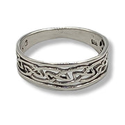 Silver ring with intricate Celtic knot design on a white background