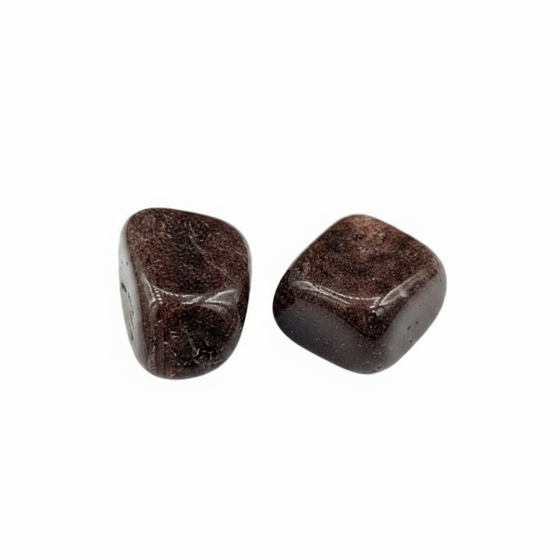 Two brown stones on a white background